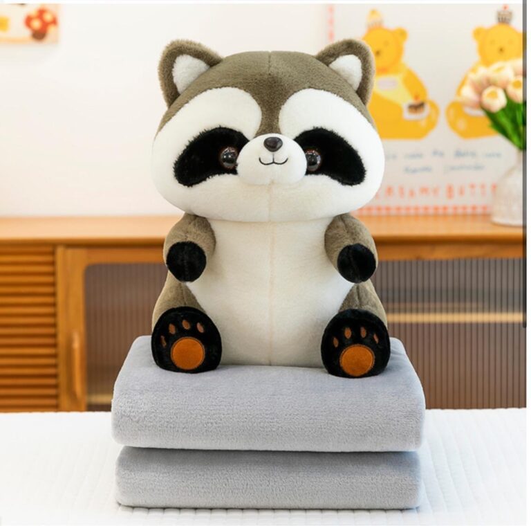 Peluche con cobija mapache