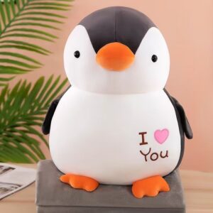 Peluche con cobija pingüino