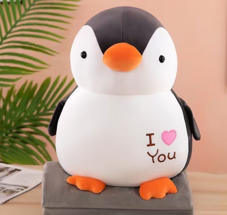Peluche con cobija pingüino